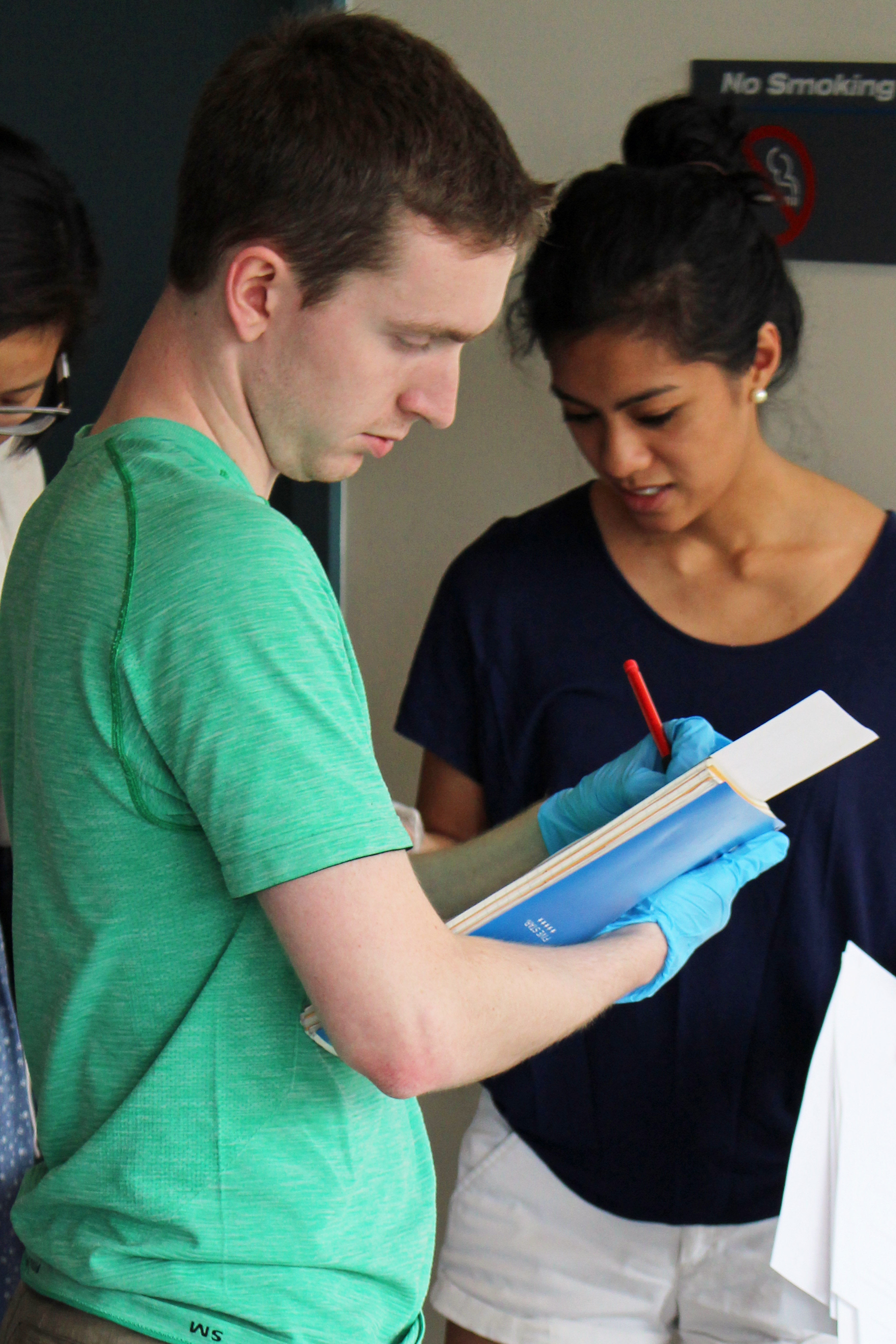 Rutgers students observe the crime scene